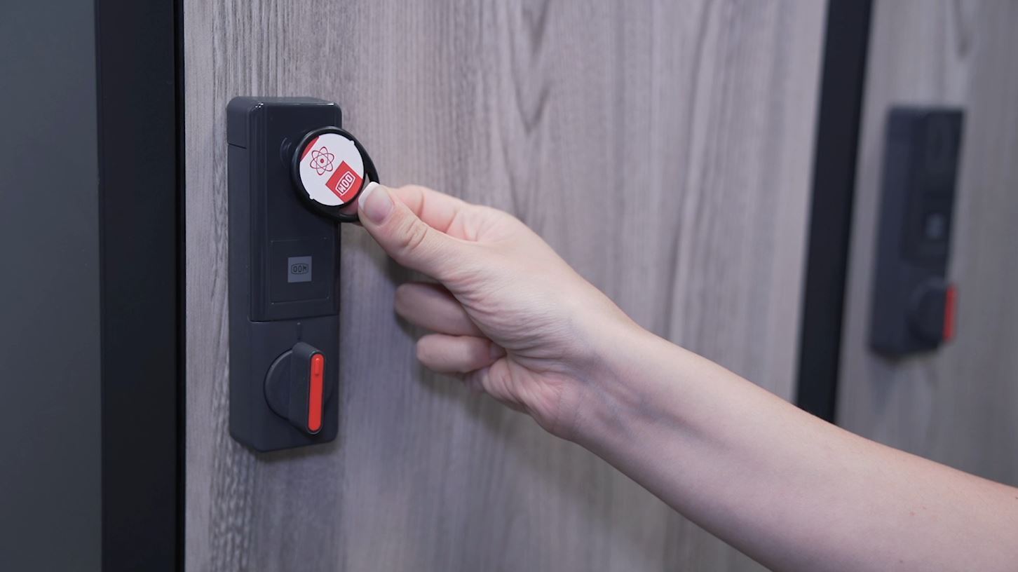 a transponder tapped to a digital furniture lock to open the locker